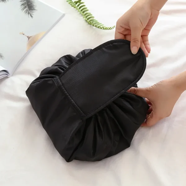 Check out the ultimate women's drawstring toiletry bag—ideal for travel and designed for easy organization! - Image 3